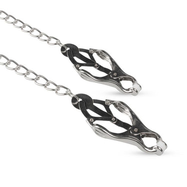 Stylish silver nipple clamps featuring cushioned tips and a connecting chain, crafted for comfort and aesthetic appeal during use.